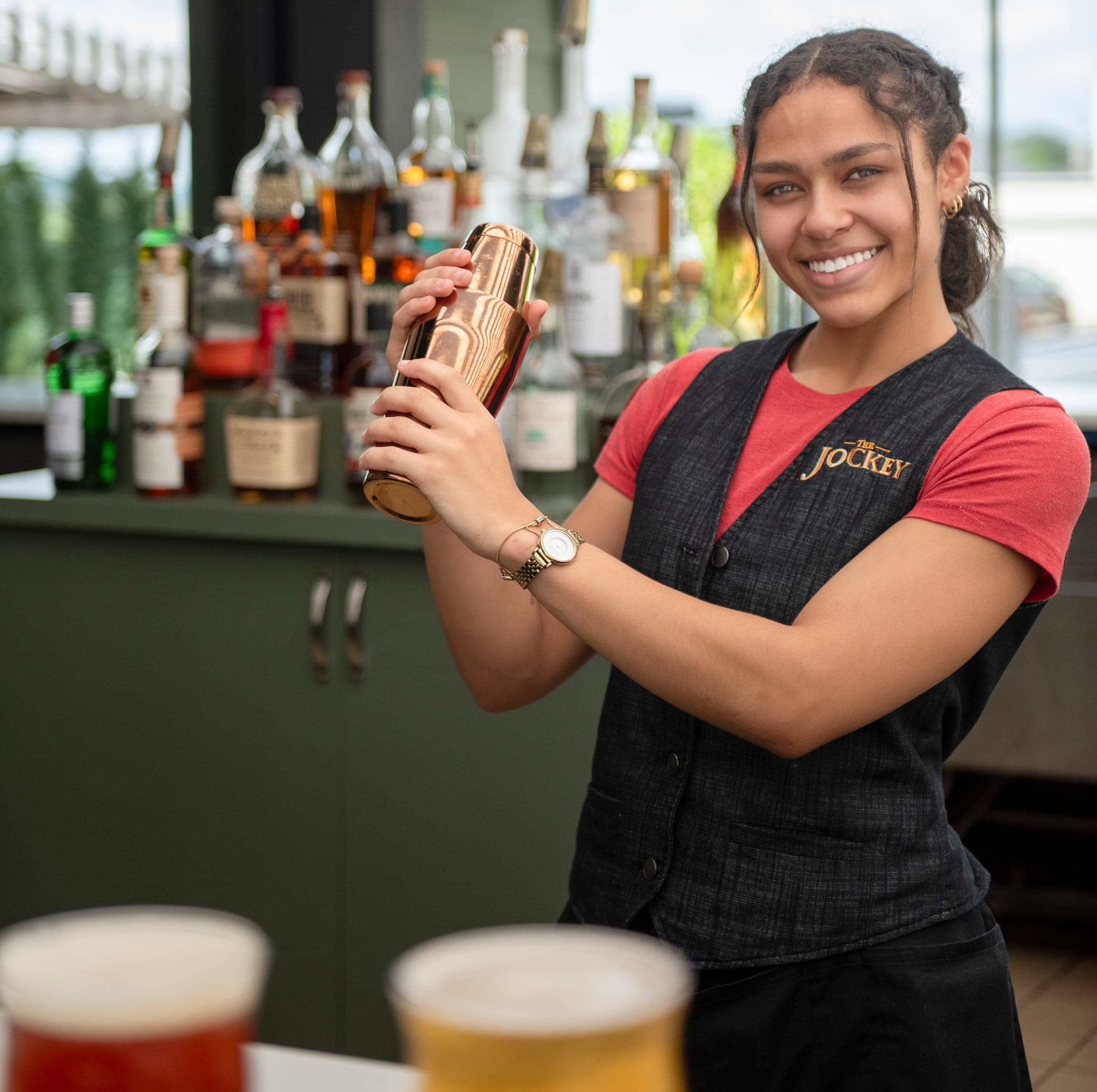 A bartender at the Veranda bar at The Jockey Tavern, Malvern, PA