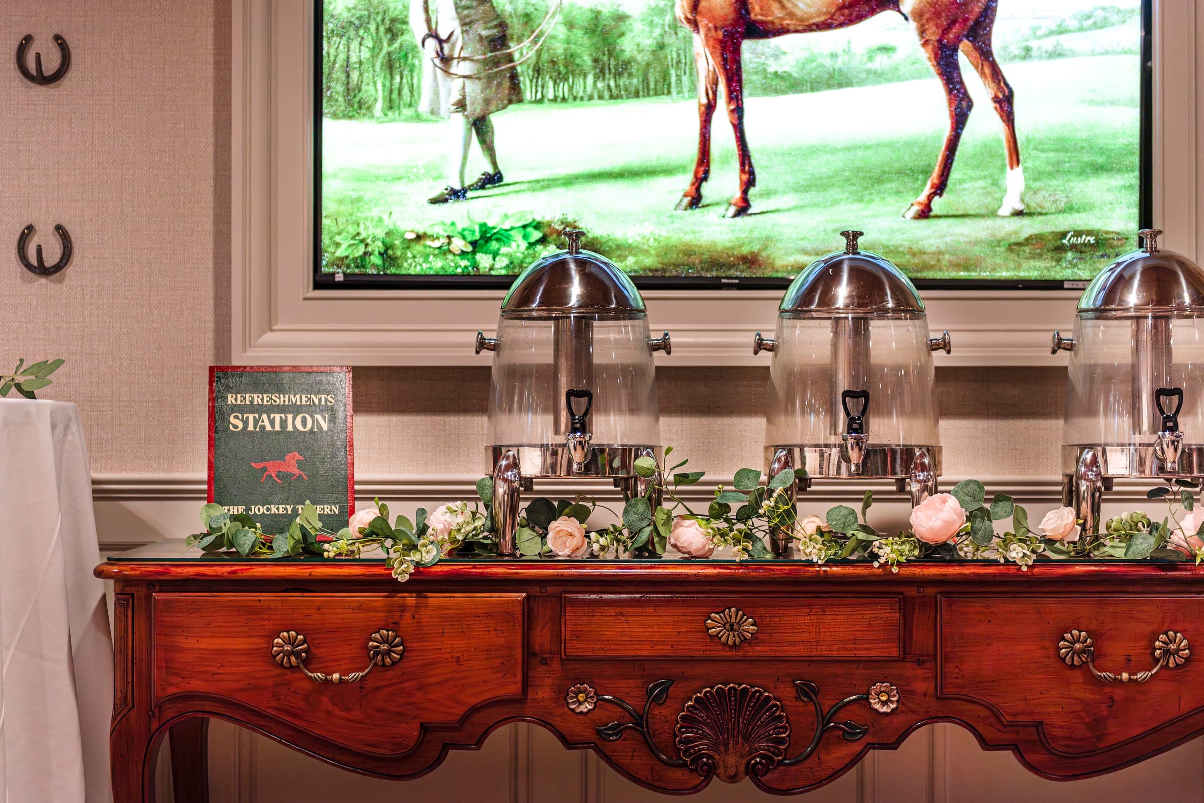 The refreshments station set on the antique sideboard for a private event at The Jockey Tavern, Malvern, PA