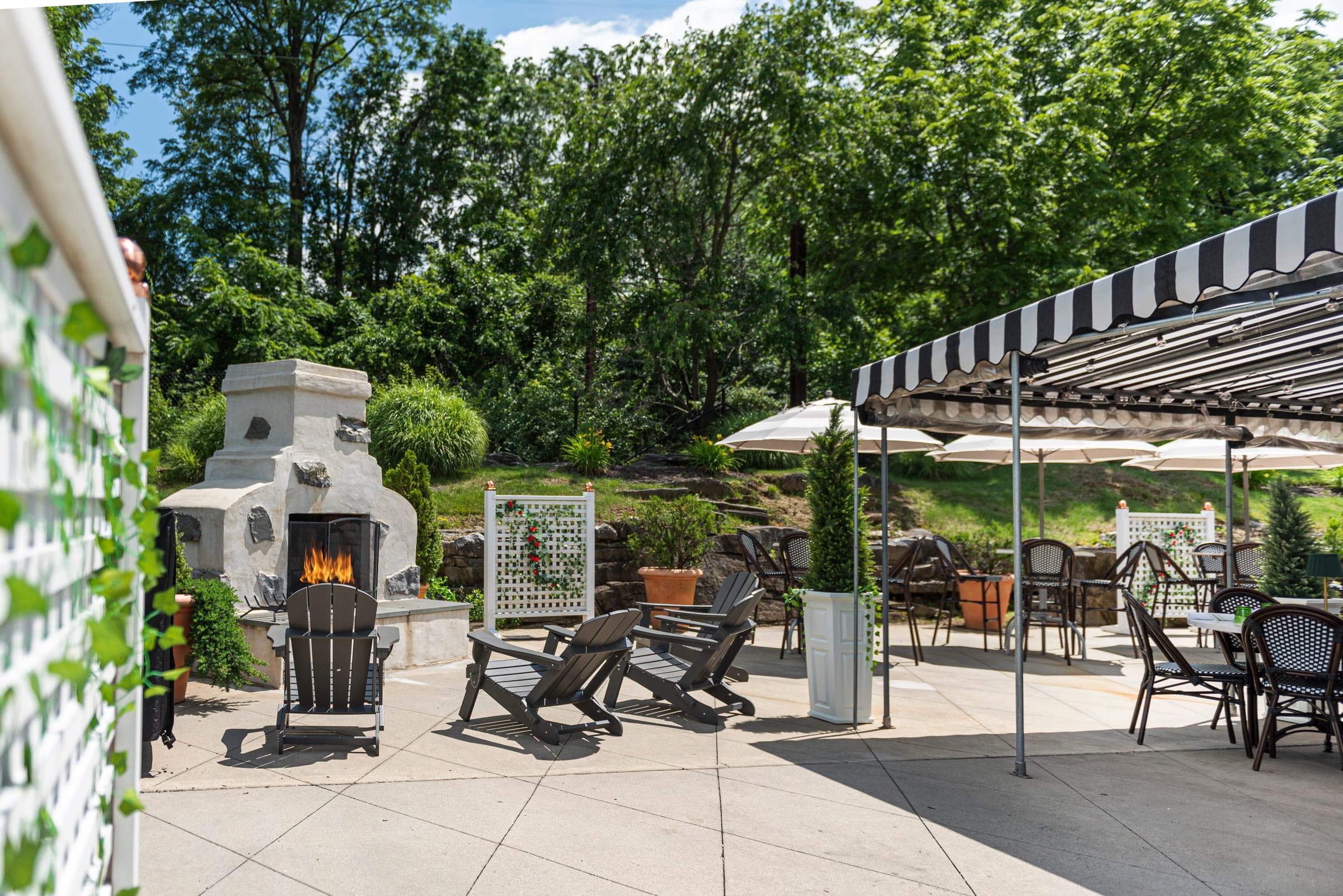 The outdoor fireplace and garden seating at The Jockey Tavern, Malvern, PA