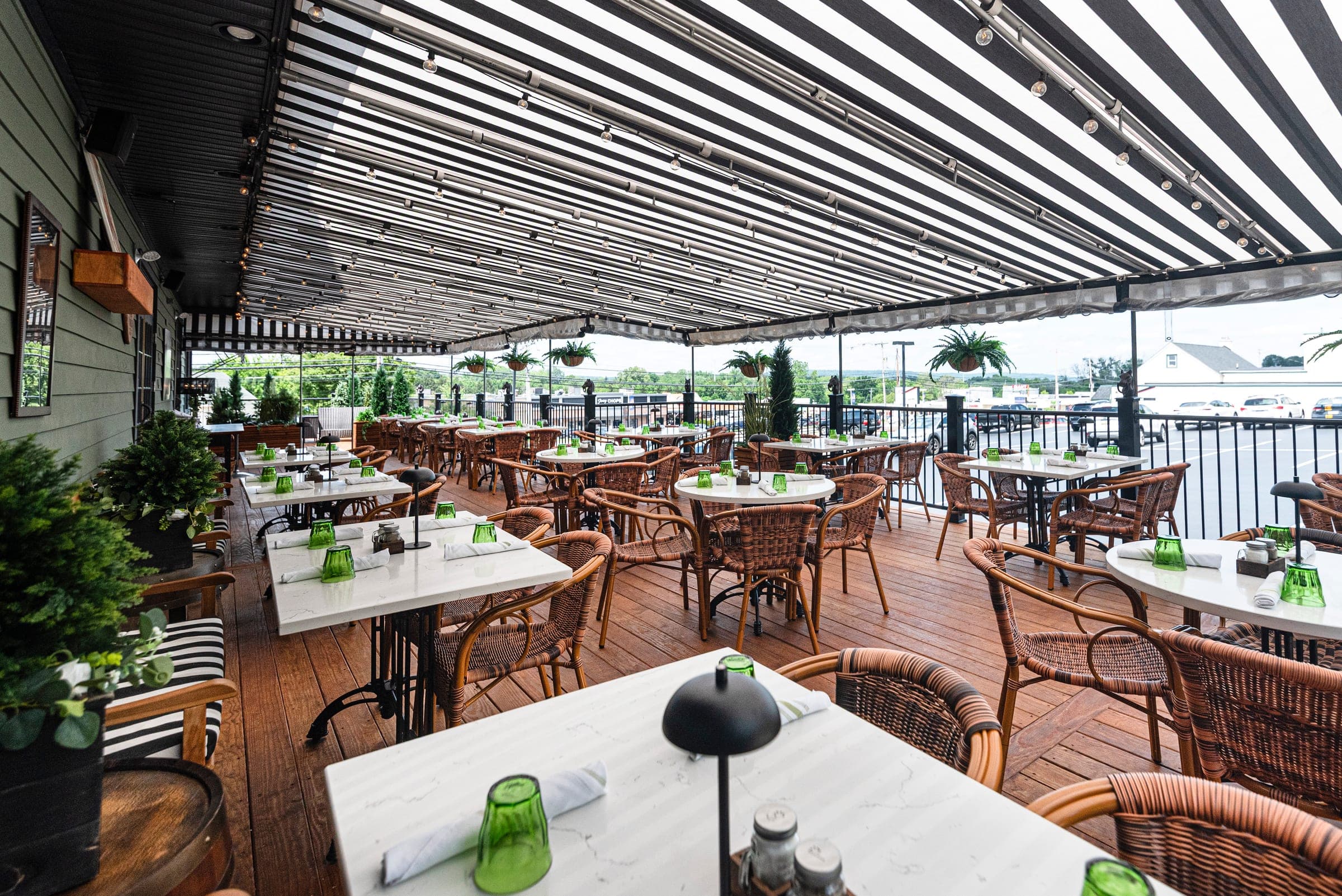 The Veranda under striped awnings at The Jockey Tavern, Malvern, PA